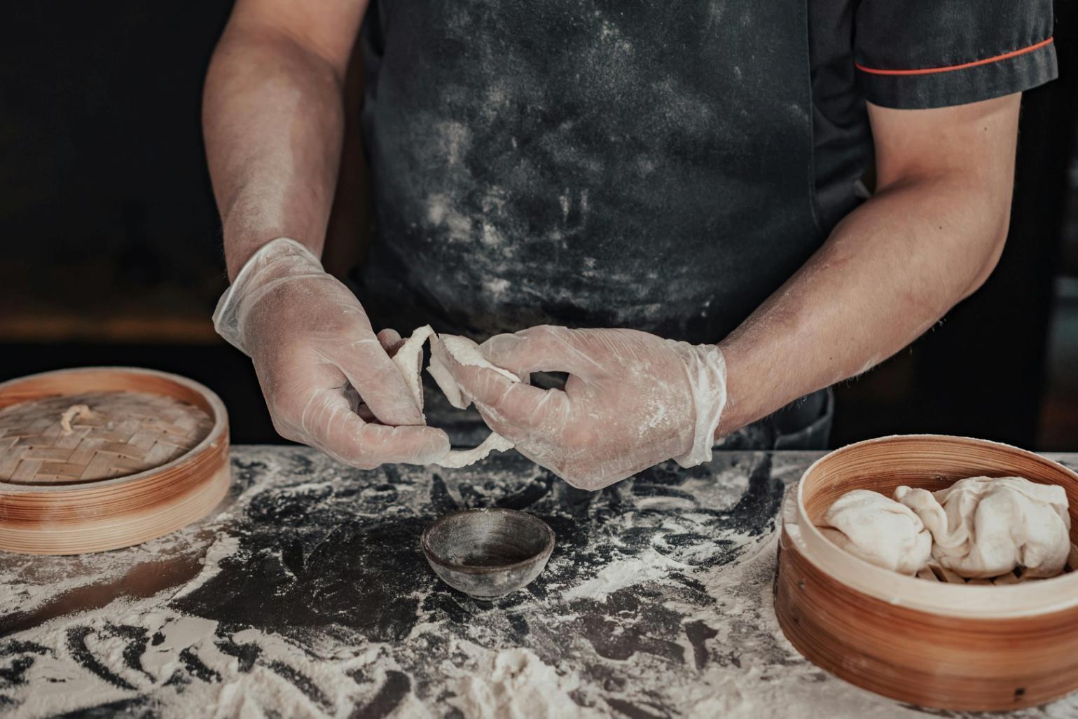 Hands preparing fresh vegetables using healthy cutting techniques learned in course
