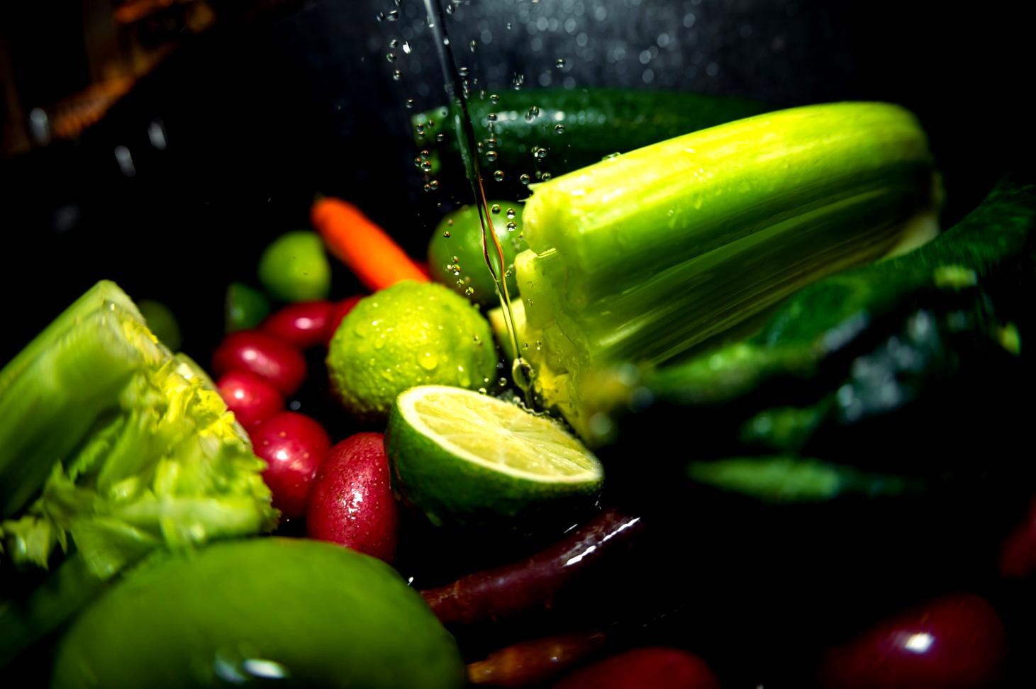 Fresh ingredients arranged on kitchen counter with natural lighting